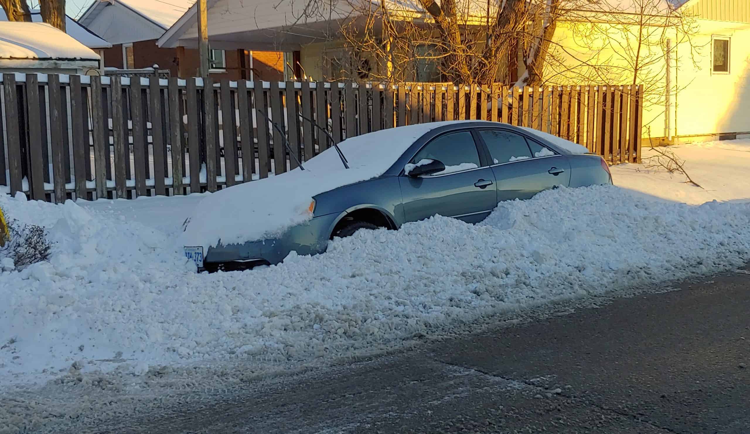car snow plow street road ticket park