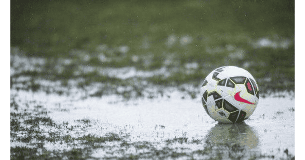 wet soccer pitch