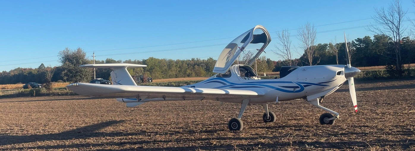 Plane crash lands in Ontario farm field.