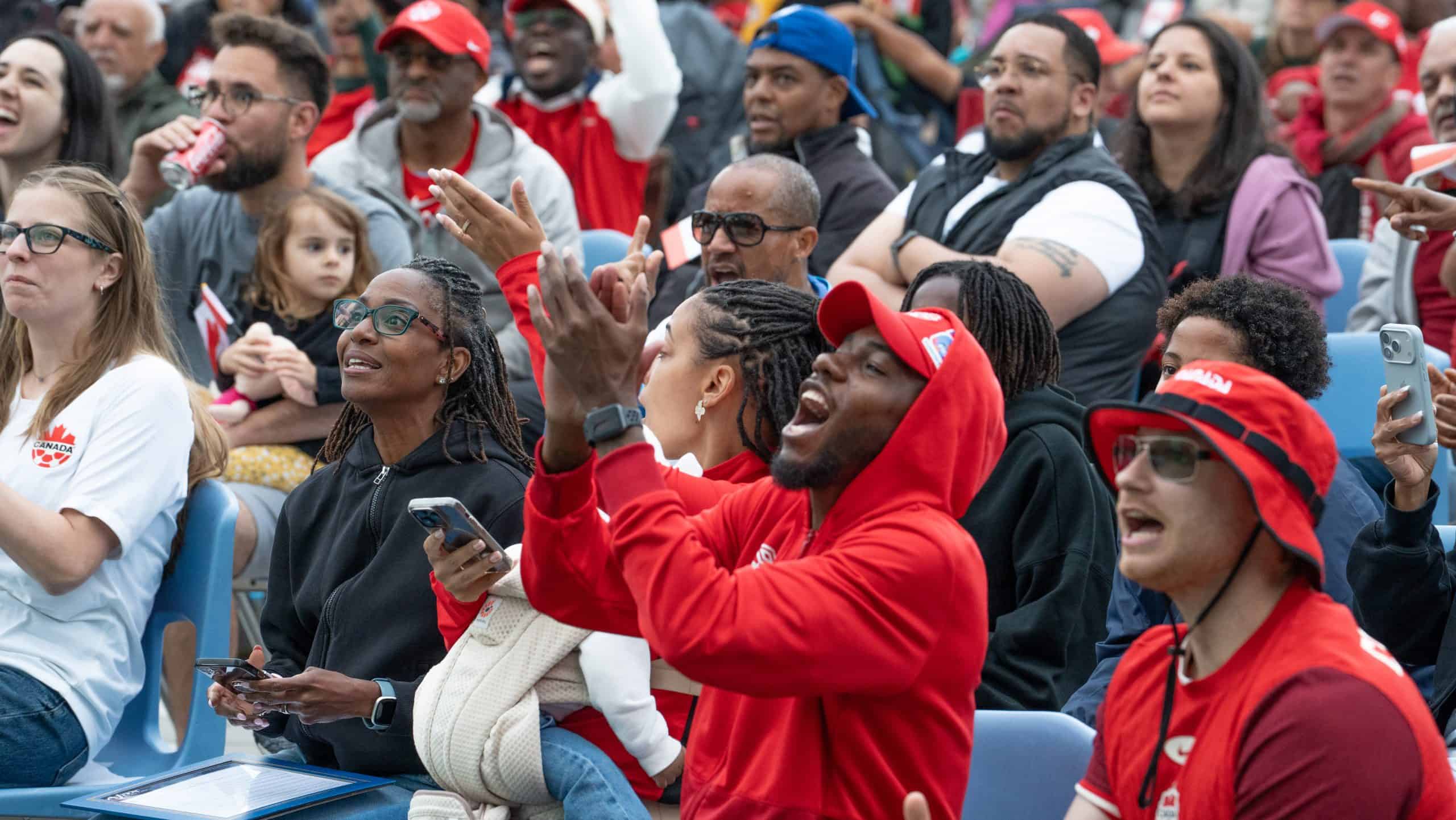 Fans in Ajax cheer on Canada at the renamed Derek Cornelius Square